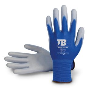 Guante soporte nailon azul sin costuras. Recubrimiento poliuretano gris en palma. Puño elástico. Galga 13.500AZ URETAN